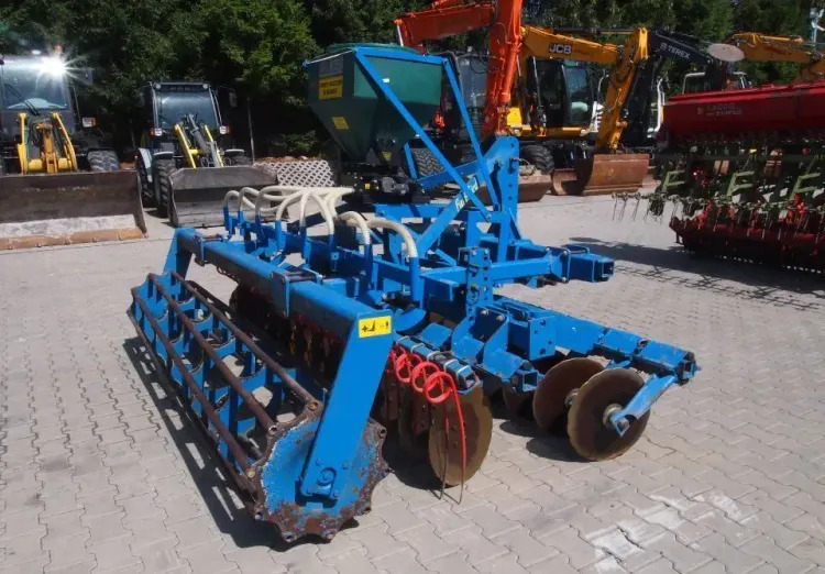 Agregat uprawowo-siewny Rabe Werk 2011 3m brona talerzowa z siewnikiem do poplonów - الة بذر: صور 5 Agregat uprawowo-siewny Rabe Werk 2011 3m brona talerzowa z siewnikiem do poplonów - الة بذر: صور 5