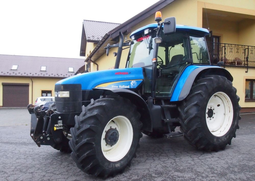 Ciągnik New Holland TM 140 2004 Przedni TUZ - جرار: صور 3 Ciągnik New Holland TM 140 2004 Przedni TUZ - جرار: صور 3