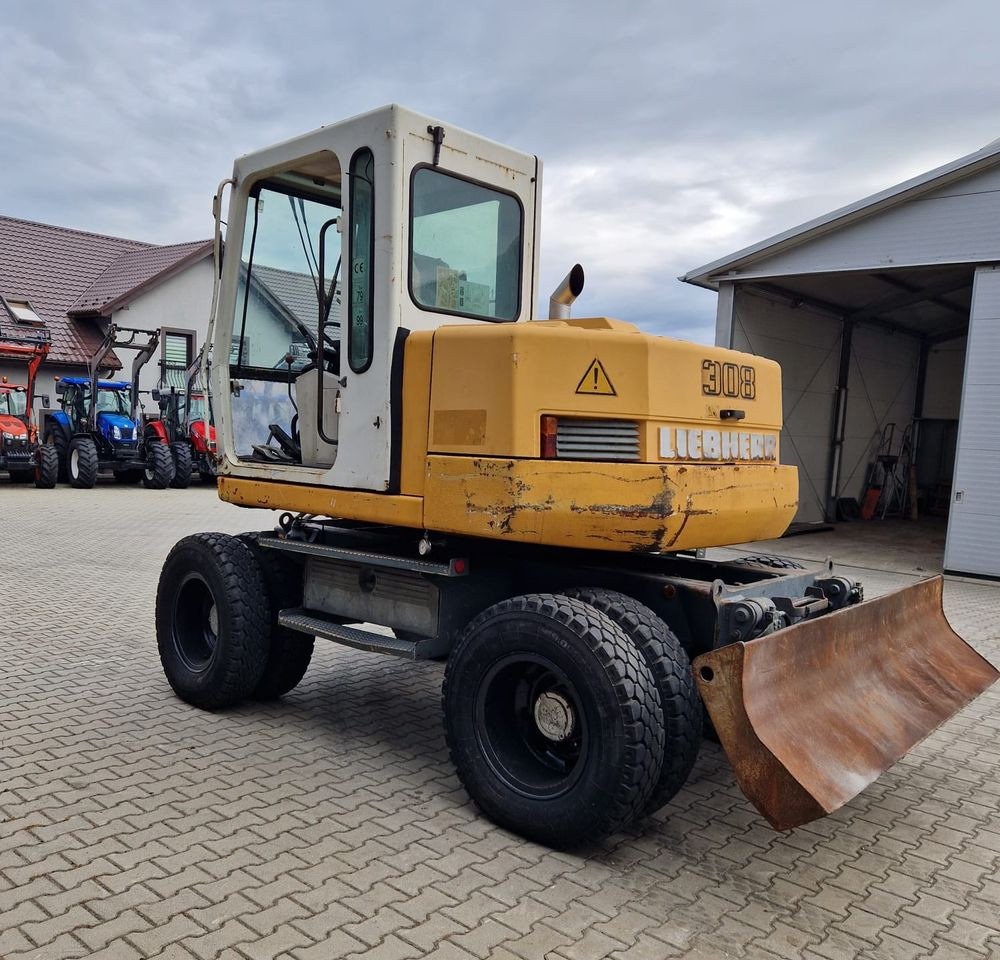 Pozostałe części Liebherr Liebherr A308 1999 Koparka kołowa Liebherr 308 - حفارة: صور 4 Pozostałe części Liebherr Liebherr A308 1999 Koparka kołowa Liebherr 308 - حفارة: صور 4