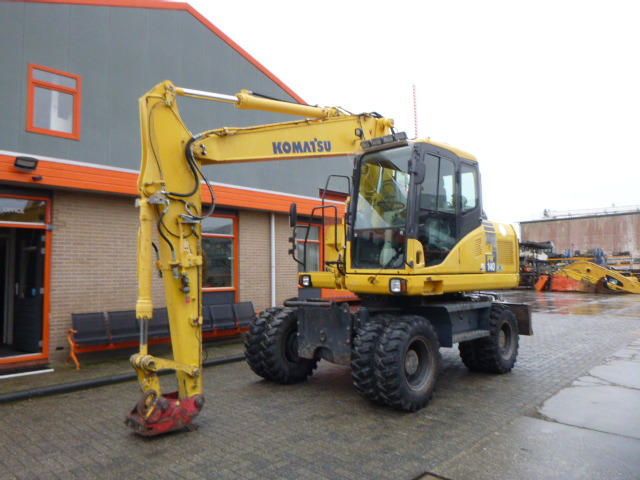 KOMATSU PW140-7 - حفارة على عجلات: صور 1 KOMATSU PW140-7 - حفارة على عجلات: صور 1