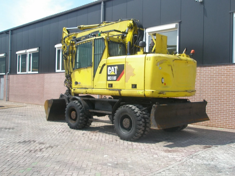 Caterpillar M318F - حفارة على عجلات: صور 2 Caterpillar M318F - حفارة على عجلات: صور 2