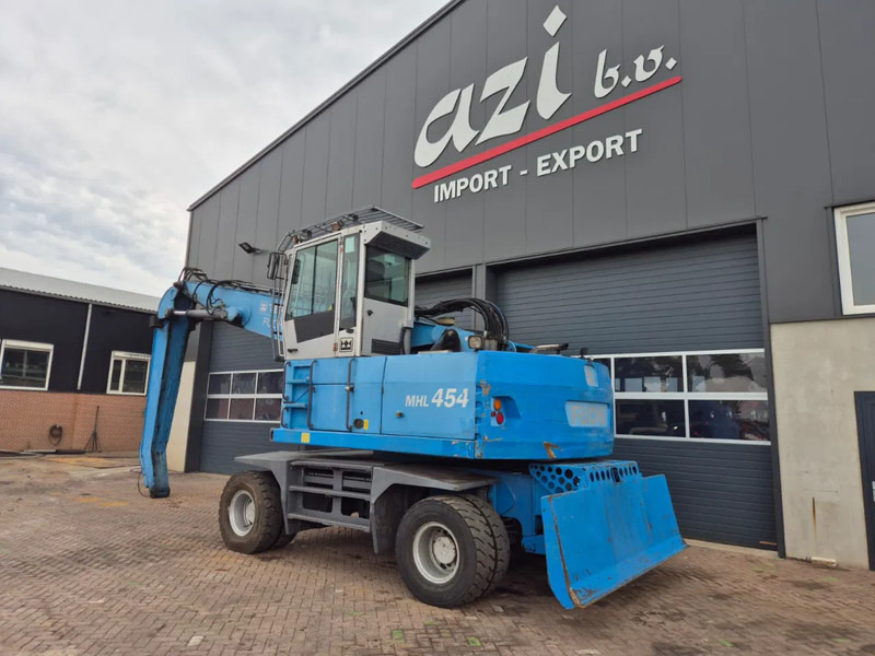Fuchs MHL454 - حفارة النقل والشحن: صور 4 Fuchs MHL454 - حفارة النقل والشحن: صور 4