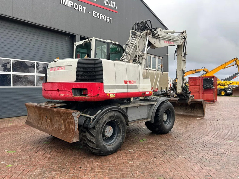 Takeuchi TB1160W - حفارة على عجلات: صور 3 Takeuchi TB1160W - حفارة على عجلات: صور 3