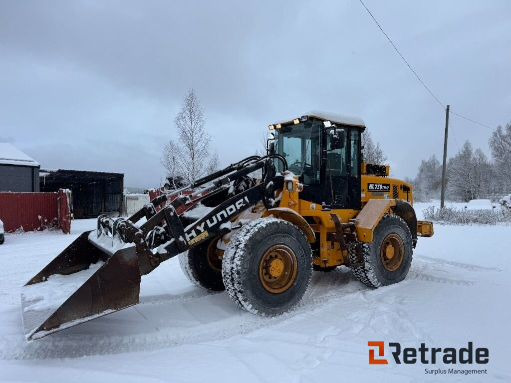 Hjullastare Hyundai HL730 TM-7 med planerskopa - اللودر بعجل: صور 1 Hjullastare Hyundai HL730 TM-7 med planerskopa - اللودر بعجل: صور 1