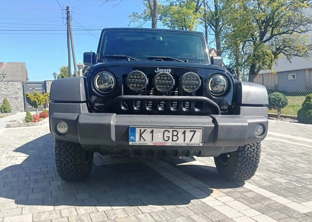 Jeep Wrangler 2.8 CRD Sport - كابريوليه: صور 4 Jeep Wrangler 2.8 CRD Sport - كابريوليه: صور 4