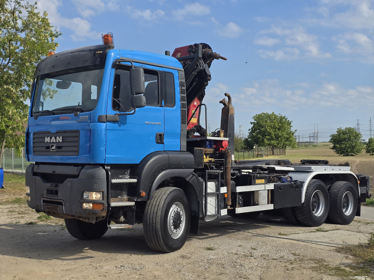 MAN TGA 33.430 6X6 / HMF 1823 K3+REM.CON./ HOOK SYSTEM - شاحنة ذات الخطاف, شاحنة كرين: صور 3 MAN TGA 33.430 6X6 / HMF 1823 K3+REM.CON./ HOOK SYSTEM - شاحنة ذات الخطاف, شاحنة كرين: صور 3