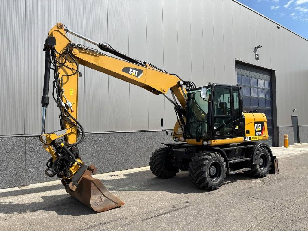 CAT M 313 D - حفارة على عجلات: صور 2 CAT M 313 D - حفارة على عجلات: صور 2