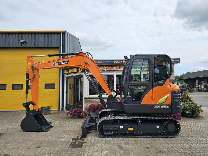 Develon DX60E-10N - حفارة مصغرة: صور 1 Develon DX60E-10N - حفارة مصغرة: صور 1