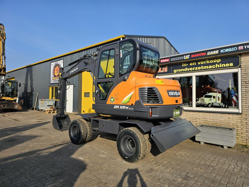 Develon DX60WN ECO-1 - حفارة على عجلات: صور 3 Develon DX60WN ECO-1 - حفارة على عجلات: صور 3