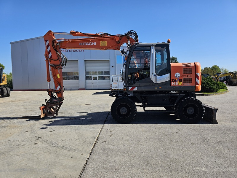 HITACHI ZX145W-3 - حفارة على عجلات: صور 1 HITACHI ZX145W-3 - حفارة على عجلات: صور 1
