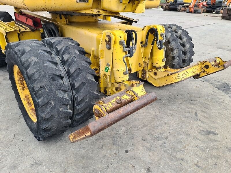 حفارة على عجلات Komatsu PW110: صور 21