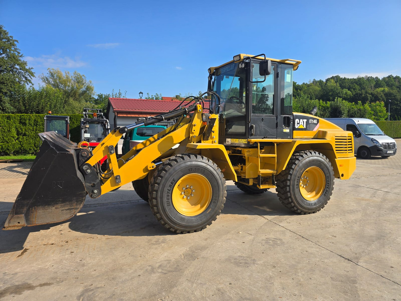 CATERPILLAR IT 14G - اللودر بعجل: صور 1 CATERPILLAR IT 14G - اللودر بعجل: صور 1