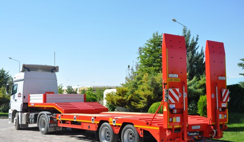 Özgül 2 AXLE LOWBED SEMI TRAILER - عربة مسطحة منخفضة نصف مقطورة: صور 1 Özgül 2 AXLE LOWBED SEMI TRAILER - عربة مسطحة منخفضة نصف مقطورة: صور 1