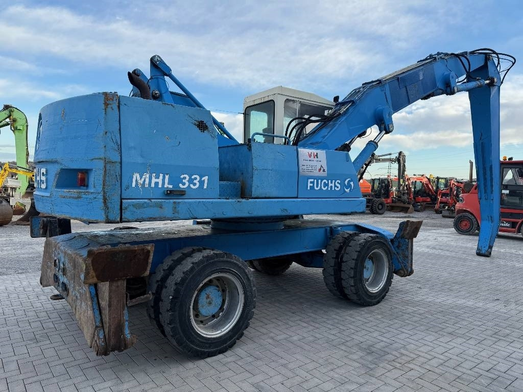 Fuchs MHL 331 - حفارة النقل والشحن: صور 5 Fuchs MHL 331 - حفارة النقل والشحن: صور 5