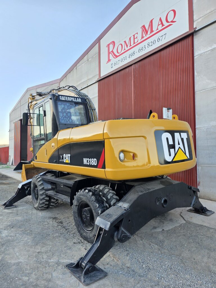 CAT M318D - حفارة على عجلات: صور 2 CAT M318D - حفارة على عجلات: صور 2