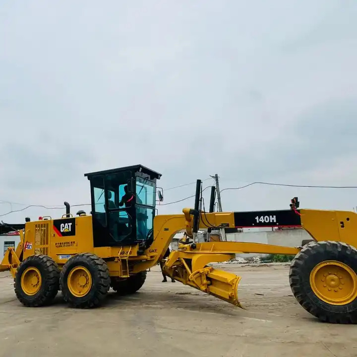 Caterpillar Used Cat Motor Grader 140h With Original Japan Cat Engine For Sale In Shanghai - آلة تسوية الأرض: صور 1 Caterpillar Used Cat Motor Grader 140h With Original Japan Cat Engine For Sale In Shanghai - آلة تسوية الأرض: صور 1