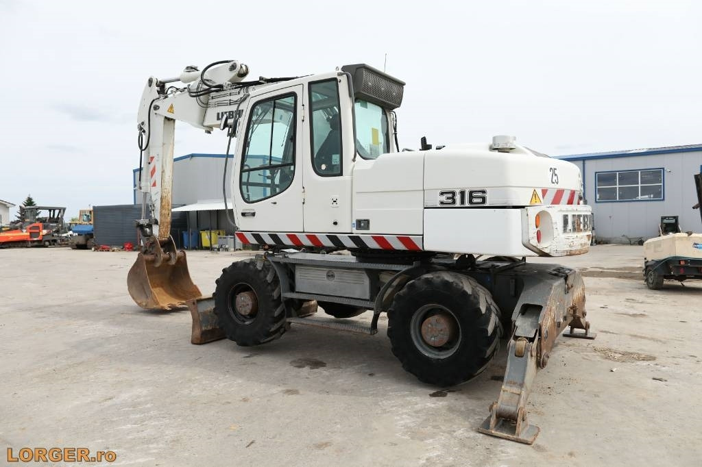 Liebherr A 316 Litronic - حفارة على عجلات: صور 3 Liebherr A 316 Litronic - حفارة على عجلات: صور 3