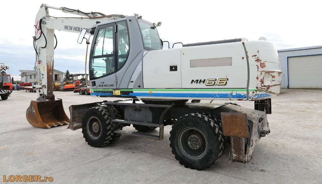 New Holland MH 6.6 + Sandvic Hammer - حفارة على عجلات: صور 3 New Holland MH 6.6 + Sandvic Hammer - حفارة على عجلات: صور 3
