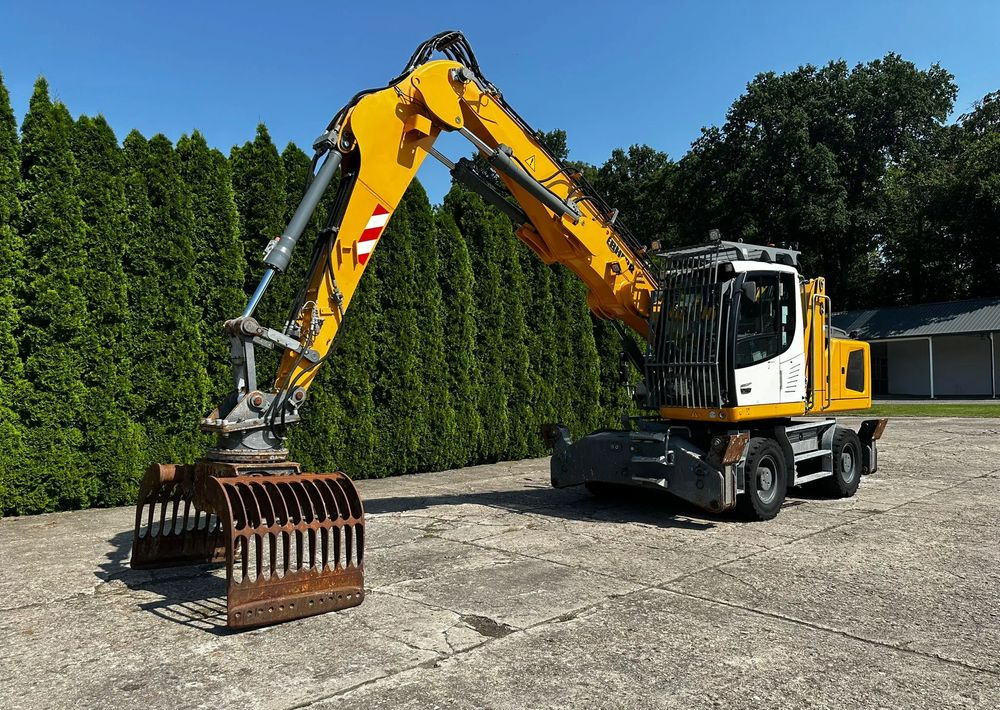 Liebherr LH22 M - حفارة على عجلات: صور 4 Liebherr LH22 M - حفارة على عجلات: صور 4