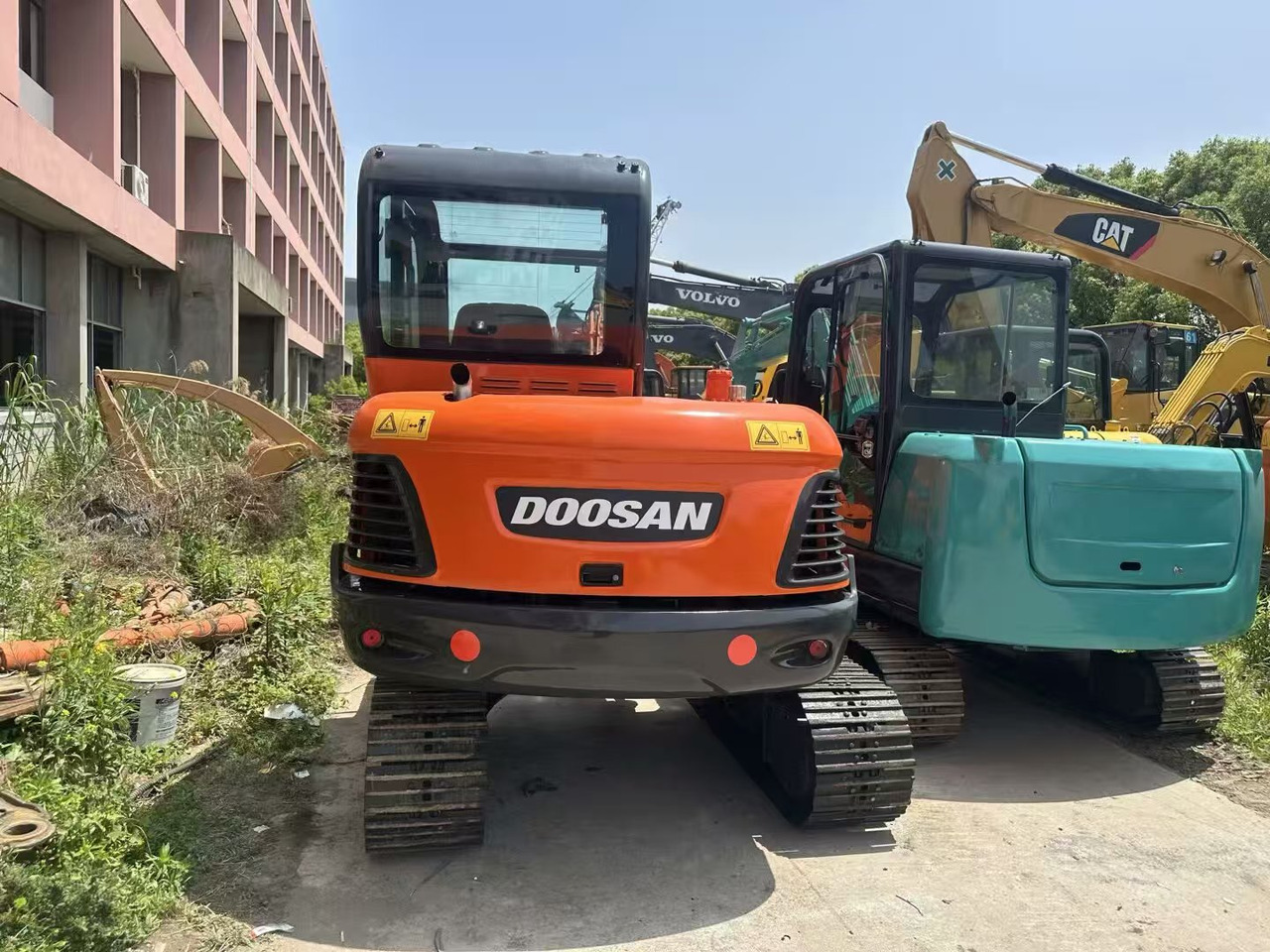 Doosan DX60 - حفارة مصغرة: صور 5 Doosan DX60 - حفارة مصغرة: صور 5