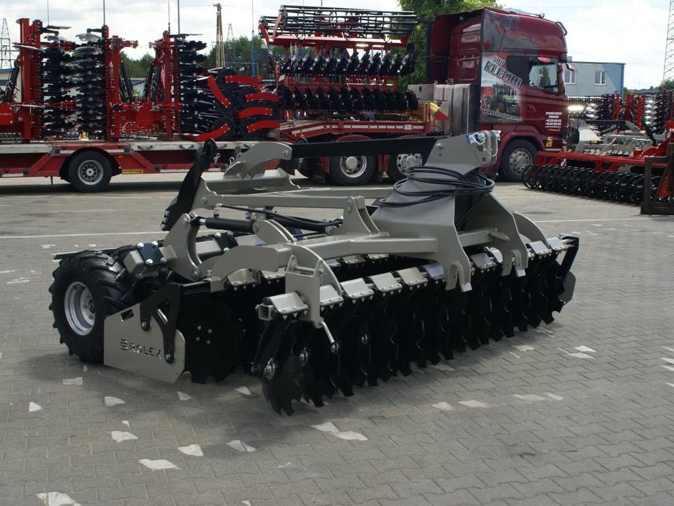 ROLEX Scheibenegge / Disc harrow with hydropack and tire roller / Dechaumeur à disques / Erpice a dischi / Дисковая борона с гидропаком и колёсным катком / Agregat talerzowy uprawowy z hydropackiem i - قرص مسلفة: صور 5 ROLEX Scheibenegge / Disc harrow with hydropack and tire roller / Dechaumeur à disques / Erpice a dischi / Дисковая борона с гидропаком и колёсным катком / Agregat talerzowy uprawowy z hydropackiem i - قرص مسلفة: صور 5