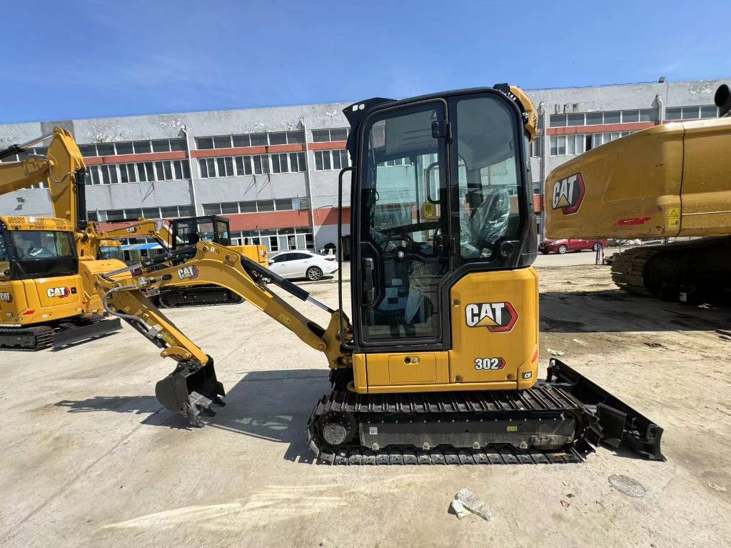 CAT 302 - حفارة مصغرة: صور 2 CAT 302 - حفارة مصغرة: صور 2