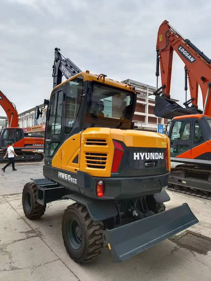 Hyundai 100% new Hyundai HW60ECO - حفارة على عجلات: صور 1 Hyundai 100% new Hyundai HW60ECO - حفارة على عجلات: صور 1