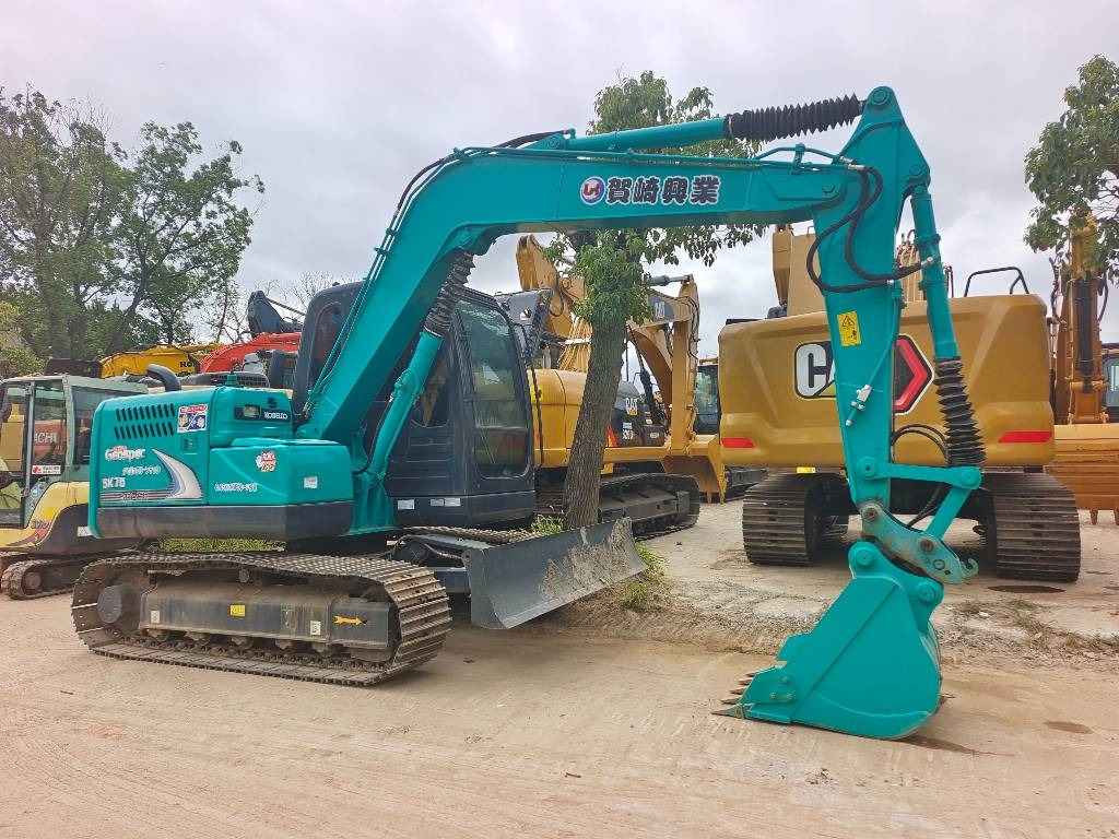 Kobelco SK 75 SR - حفارة مصغرة: صور 1 Kobelco SK 75 SR - حفارة مصغرة: صور 1