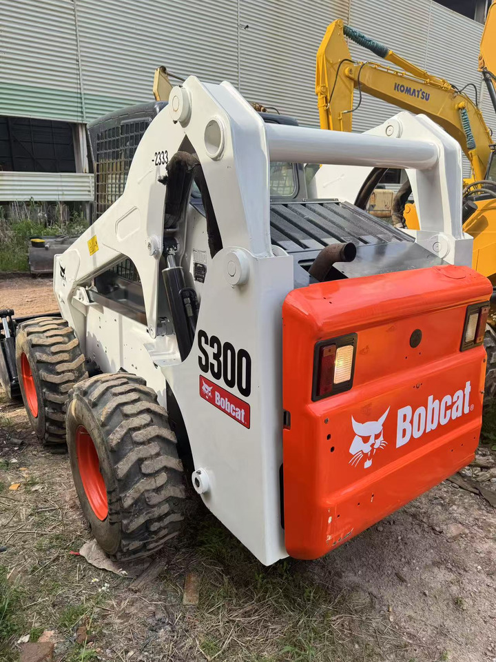 BOBCAT S300 - شيول صغير: صور 1 BOBCAT S300 - شيول صغير: صور 1