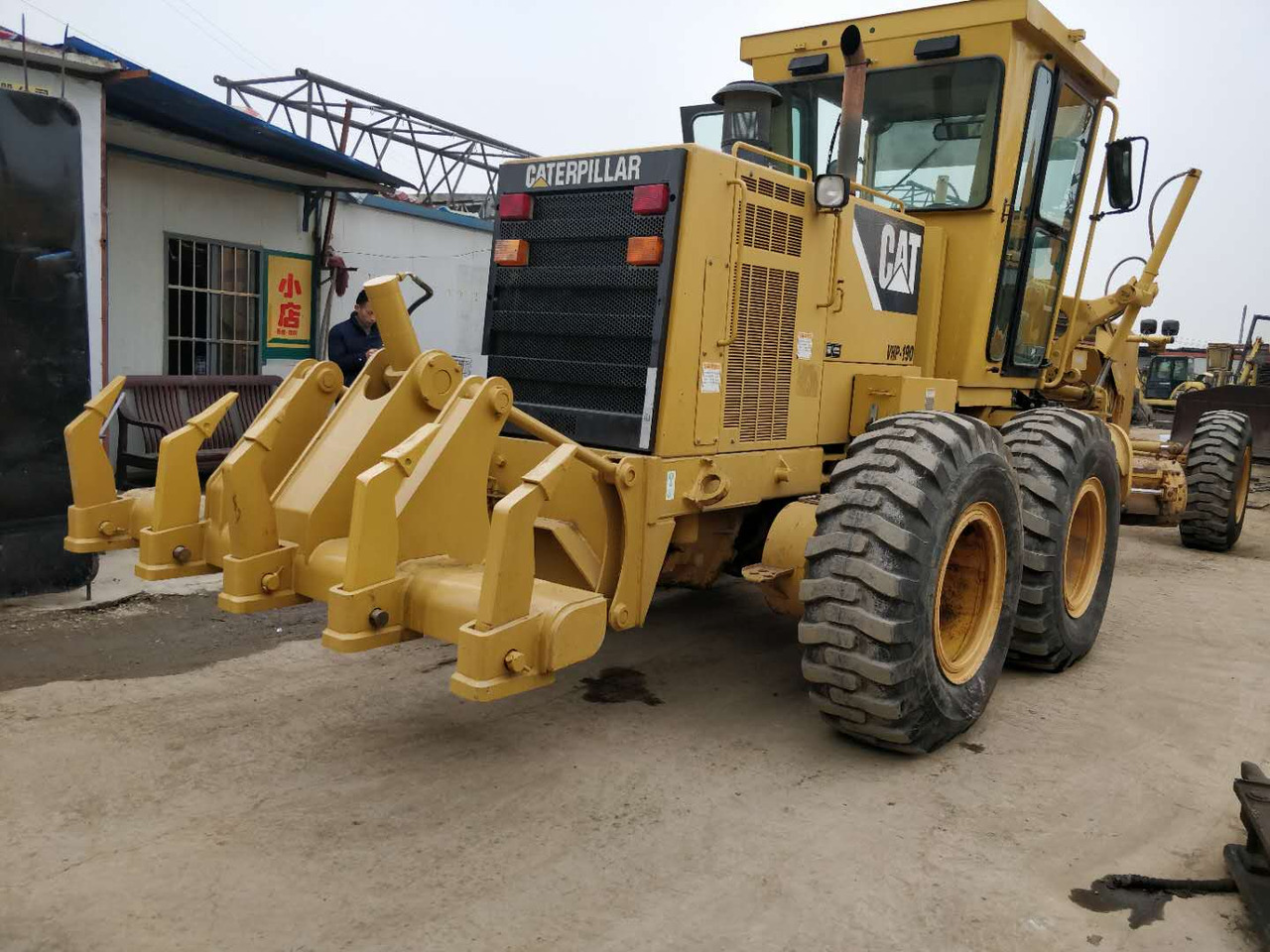 CATERPILLAR 140H - آلة تسوية الأرض: صور 2 CATERPILLAR 140H - آلة تسوية الأرض: صور 2