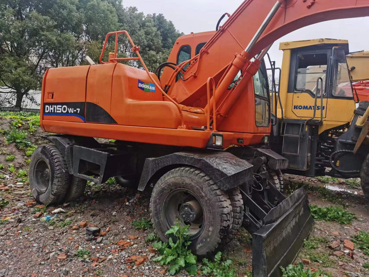 DOOSAN DH150W-7 - حفارة على عجلات: صور 4 DOOSAN DH150W-7 - حفارة على عجلات: صور 4