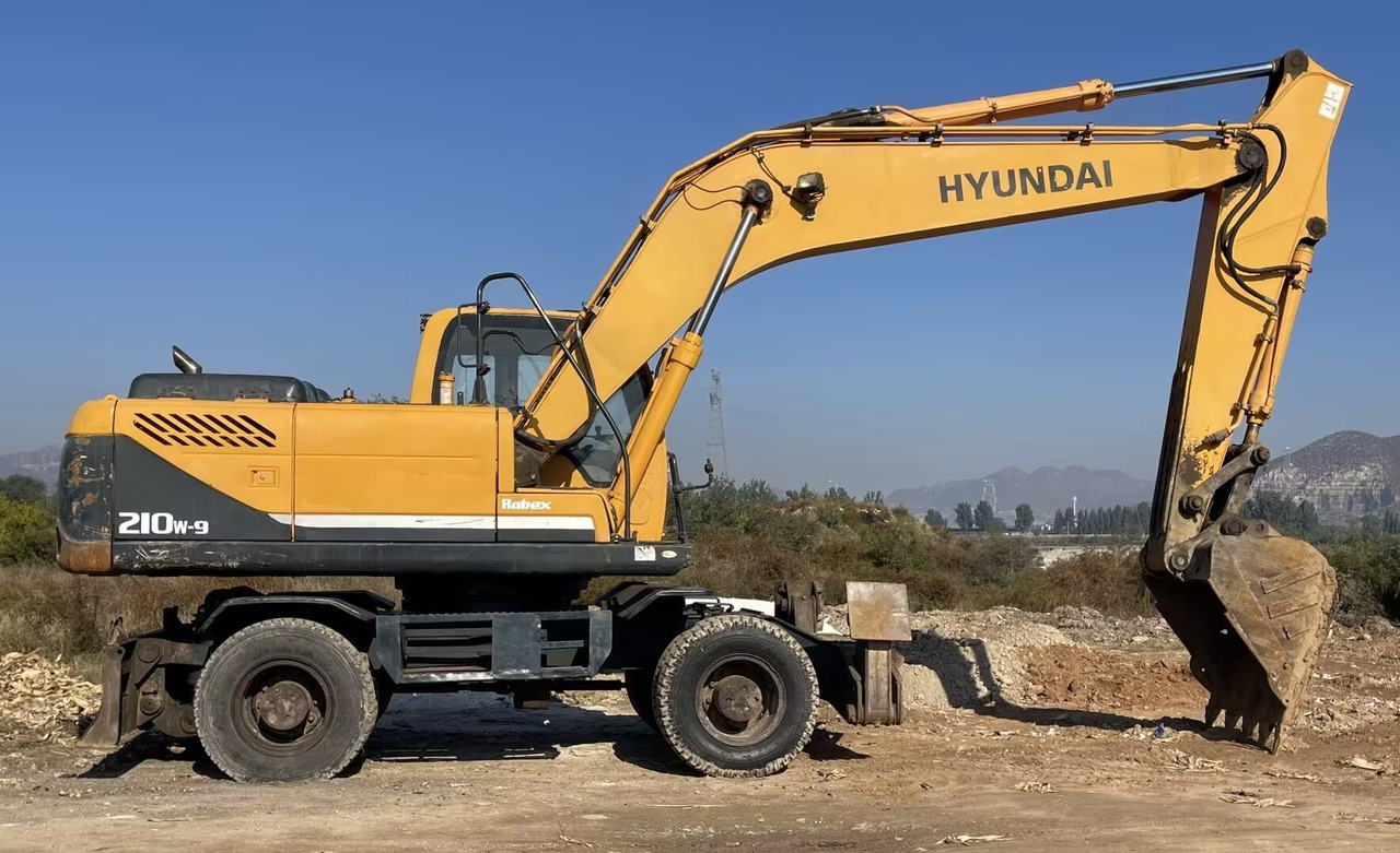 HYUNDAI 210W-9 - حفارة على عجلات: صور 2 HYUNDAI 210W-9 - حفارة على عجلات: صور 2
