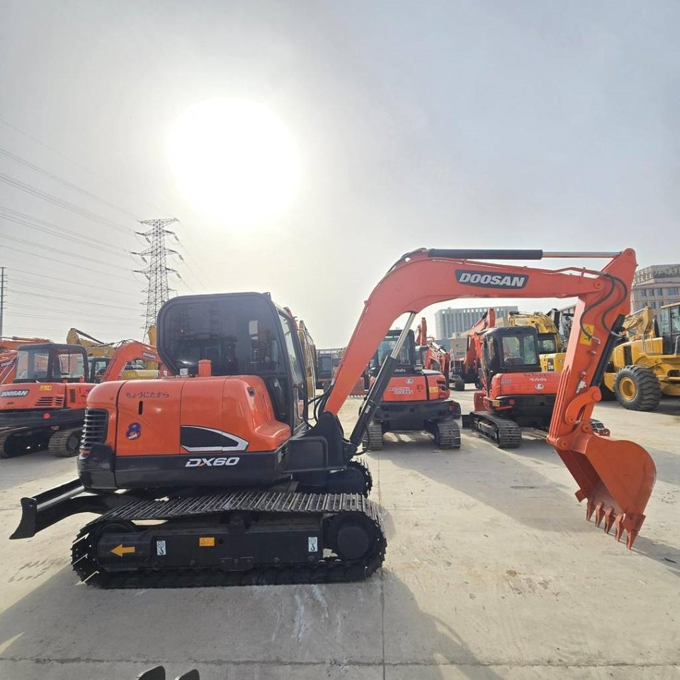 Doosan DX 60-9 C - حفارة مصغرة: صور 1 Doosan DX 60-9 C - حفارة مصغرة: صور 1
