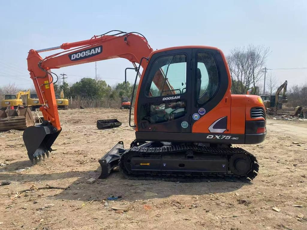 Doosan DX 75-9 C - حفارة مصغرة: صور 1 Doosan DX 75-9 C - حفارة مصغرة: صور 1