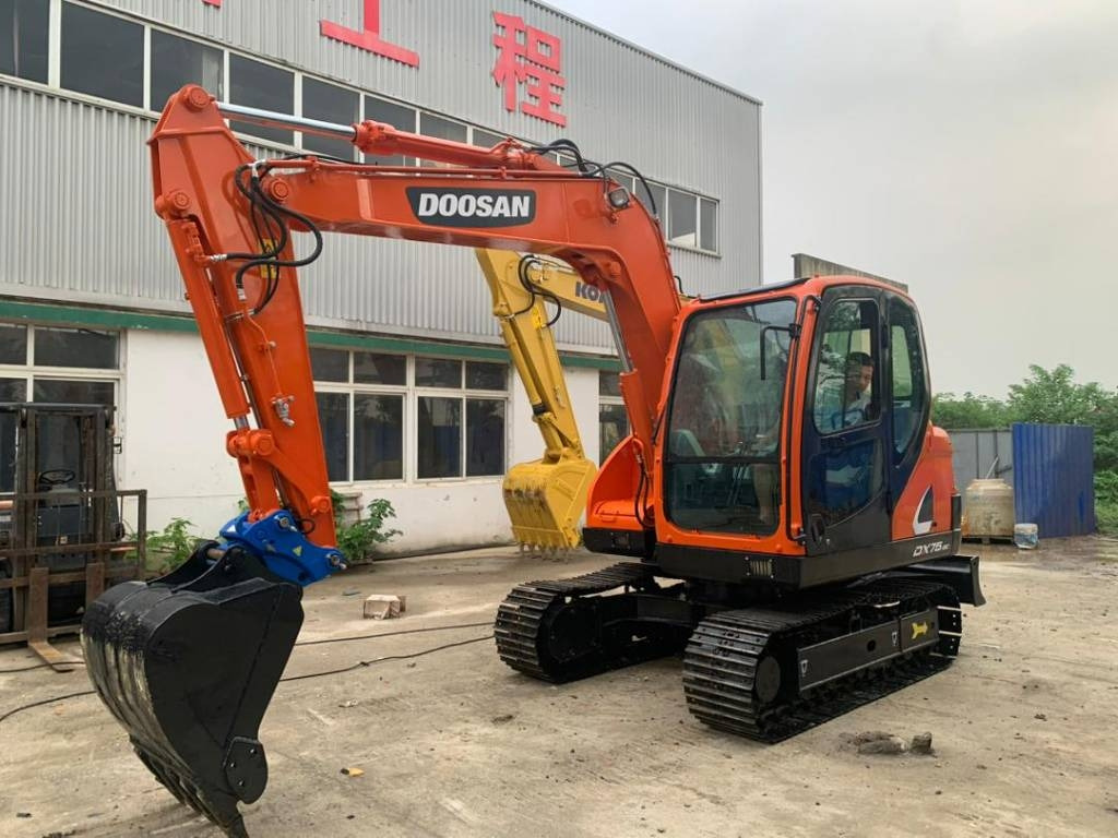 Doosan DX 75-9 C - حفارة مصغرة: صور 1 Doosan DX 75-9 C - حفارة مصغرة: صور 1