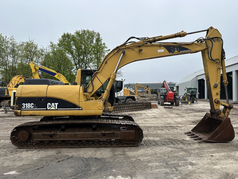 Caterpillar 318 CL Good undercarriage (not 320CL - 325CL) - حفارات زحافة: صور 4 Caterpillar 318 CL Good undercarriage (not 320CL - 325CL) - حفارات زحافة: صور 4