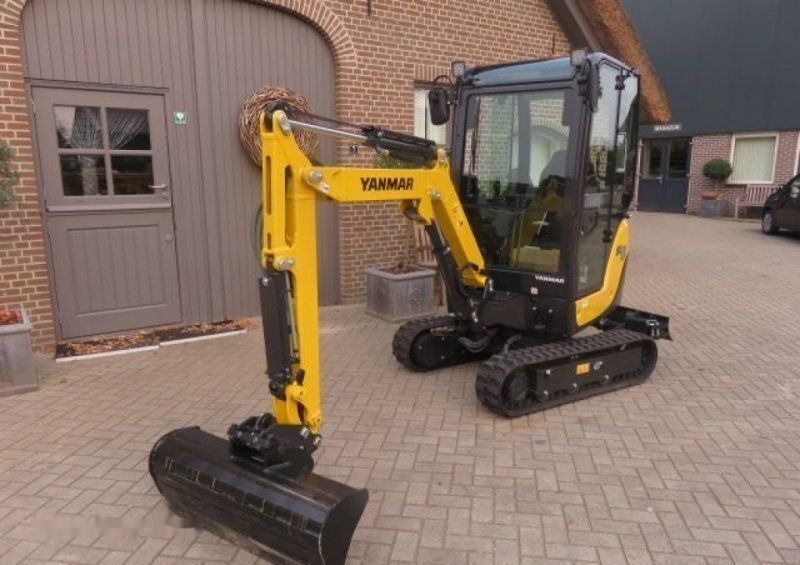 Yanmar mini - المحرك - حفارة مصغرة: صور 1 Yanmar mini - المحرك - حفارة مصغرة: صور 1