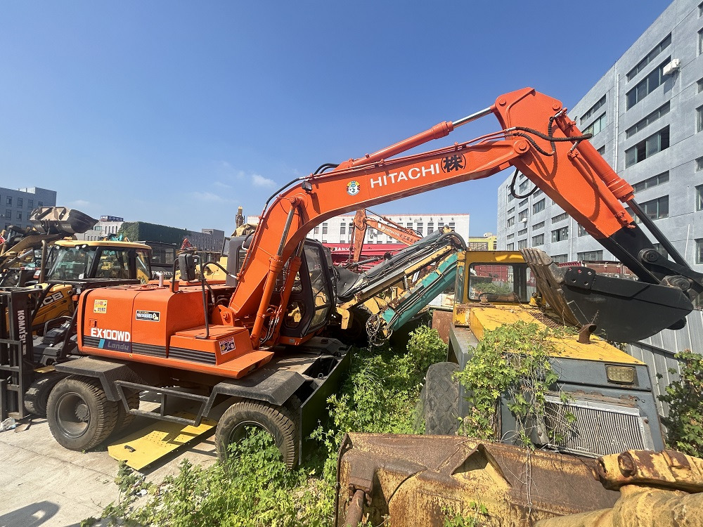 HITACHI Hitachi EX100WD wheel excavator - حفارة على عجلات: صور 1 HITACHI Hitachi EX100WD wheel excavator - حفارة على عجلات: صور 1