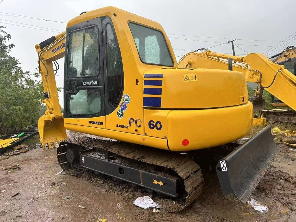 Komatsu PC 60 - حفارة مصغرة: صور 1 Komatsu PC 60 - حفارة مصغرة: صور 1