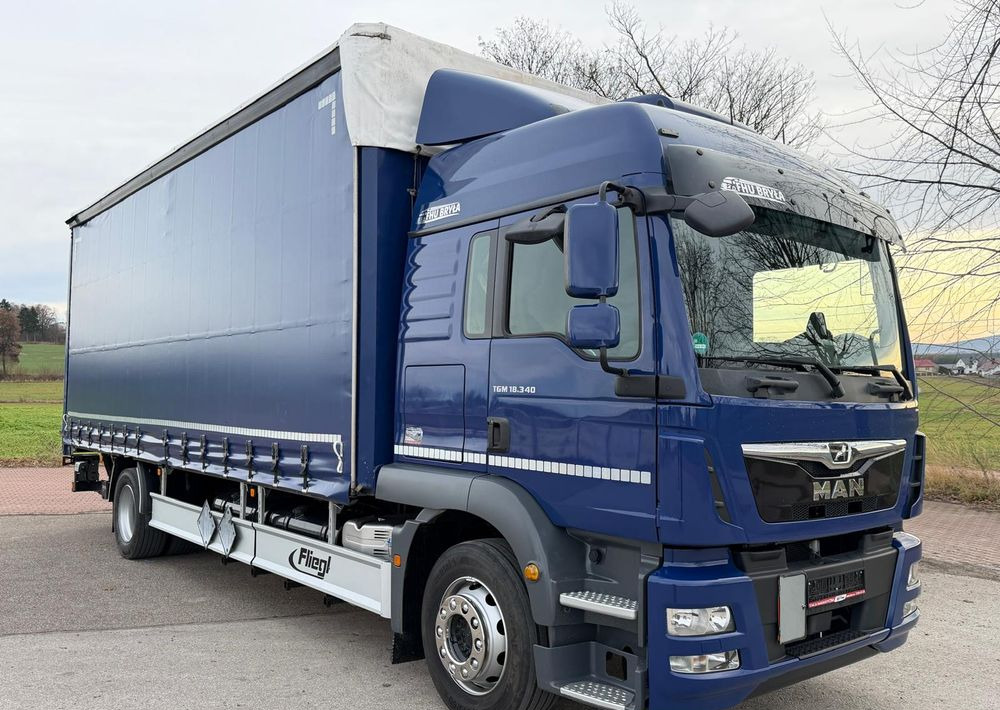MAN TGM 18.340 / FIRANKA / LIFT / SPROWADZONY / KLIMA POSTOJOWA / 2017 / 9700 ŁADOWNOŚĆ / AUTOMAT / 18 PALET / E6 / WINDA / - شاحنة ستارة: صور 1 MAN TGM 18.340 / FIRANKA / LIFT / SPROWADZONY / KLIMA POSTOJOWA / 2017 / 9700 ŁADOWNOŚĆ / AUTOMAT / 18 PALET / E6 / WINDA / - شاحنة ستارة: صور 1