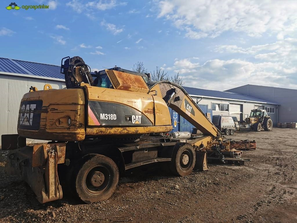 CAT M 318 D - حفارة النقل والشحن: صور 3 CAT M 318 D - حفارة النقل والشحن: صور 3