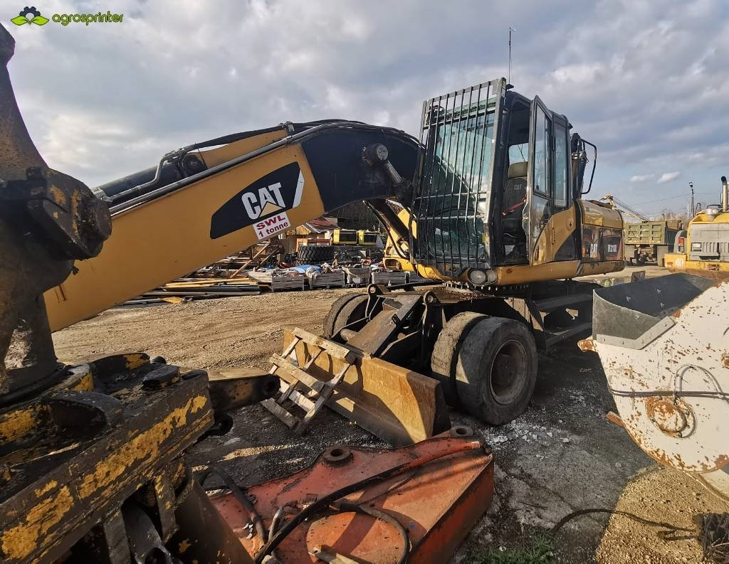 CAT M 318 D - حفارة النقل والشحن: صور 2 CAT M 318 D - حفارة النقل والشحن: صور 2