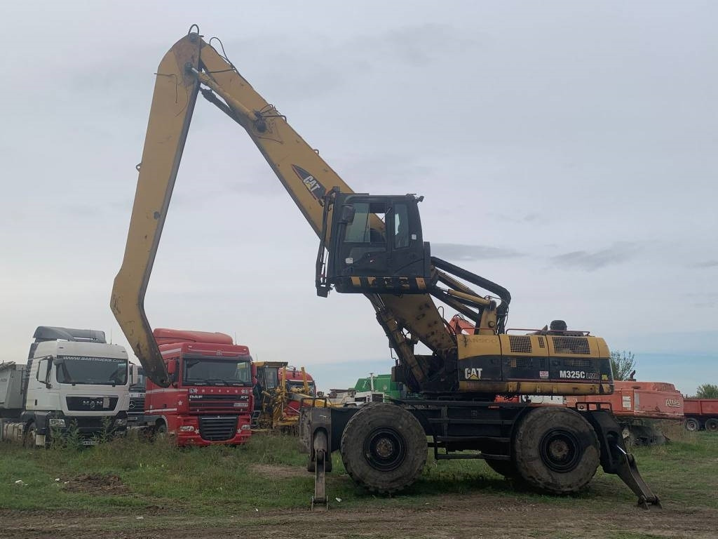 CAT M 325 C L MH - حفارة النقل والشحن: صور 2 CAT M 325 C L MH - حفارة النقل والشحن: صور 2