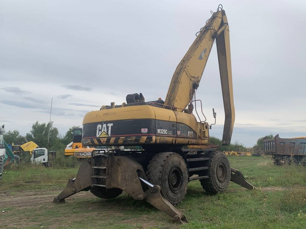 CAT M 325 C L MH - حفارة النقل والشحن: صور 4 CAT M 325 C L MH - حفارة النقل والشحن: صور 4