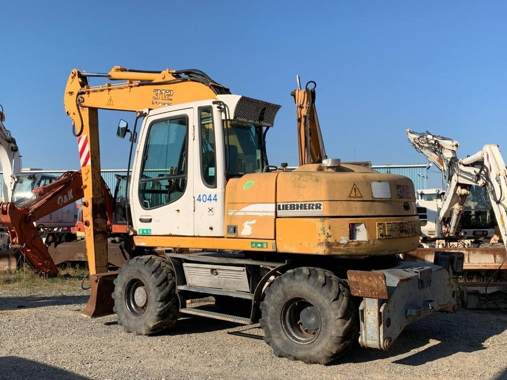 Liebherr A 312 - حفارة على عجلات: صور 3 Liebherr A 312 - حفارة على عجلات: صور 3