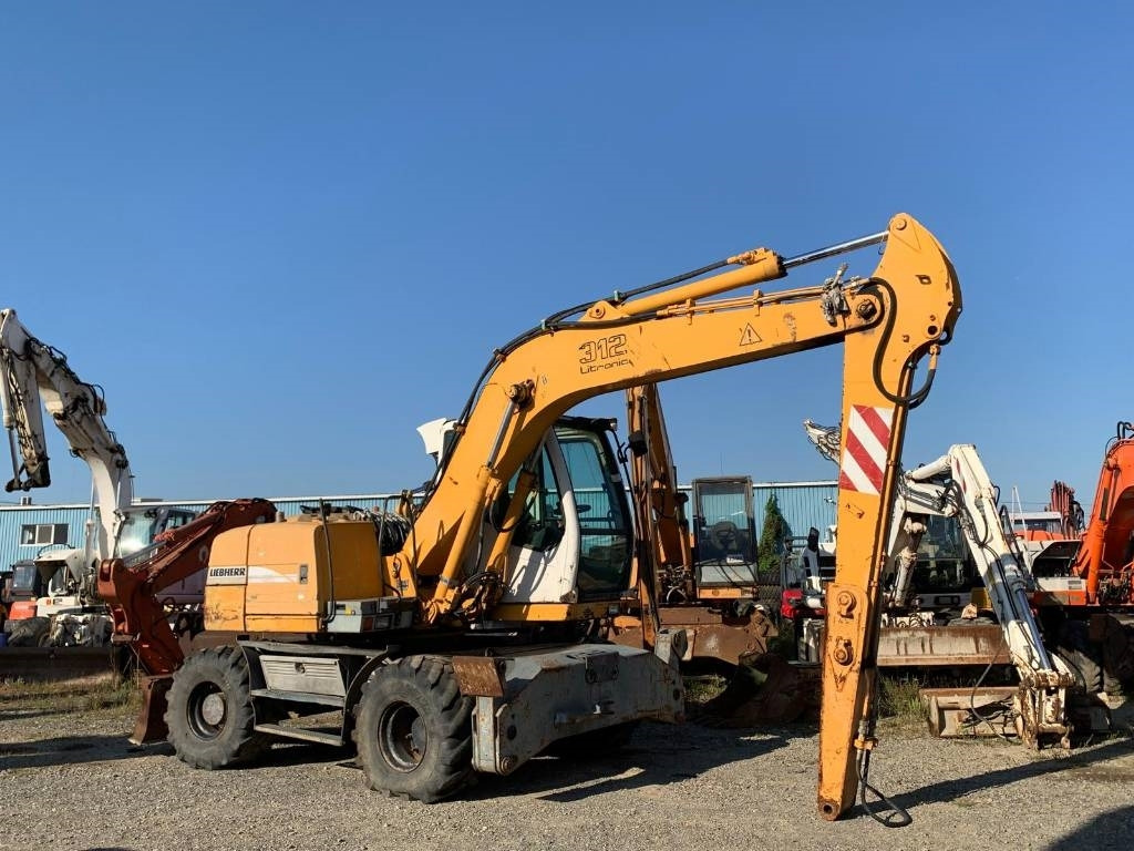 Liebherr A 312 - حفارة على عجلات: صور 5 Liebherr A 312 - حفارة على عجلات: صور 5