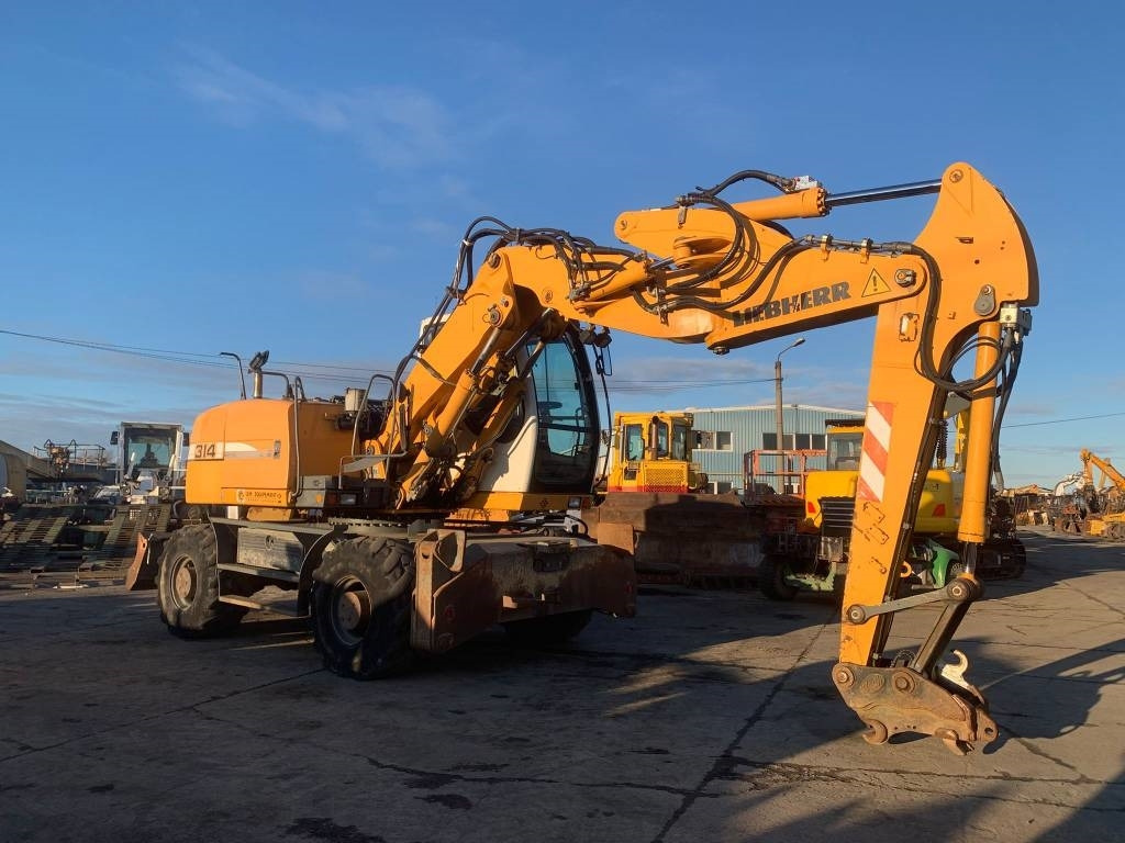 Liebherr A 314 Litronic - حفارة على عجلات: صور 5 Liebherr A 314 Litronic - حفارة على عجلات: صور 5