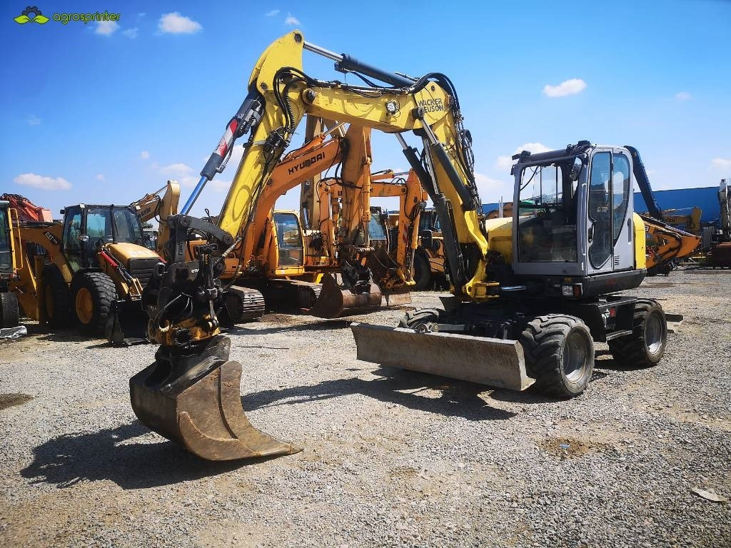 Wacker Neuson EW 100 - حفارة على عجلات: صور 1 Wacker Neuson EW 100 - حفارة على عجلات: صور 1
