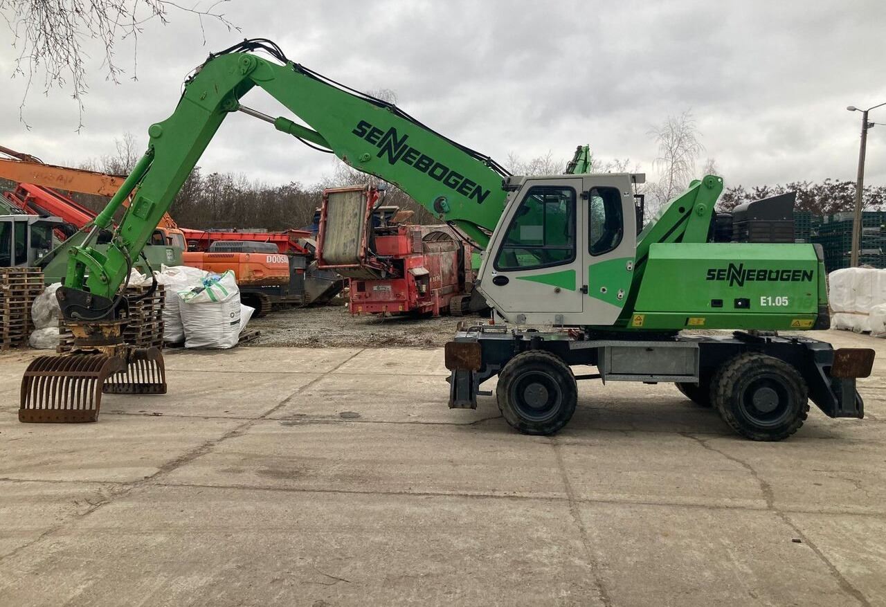 Sennebogen 818 M - حفارة النقل والشحن: صور 1 Sennebogen 818 M - حفارة النقل والشحن: صور 1