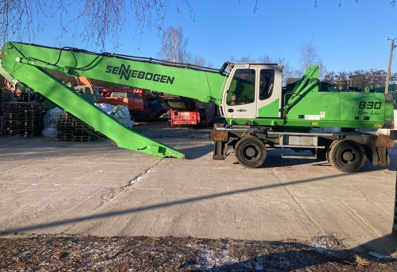 Sennebogen 830 - حفارة النقل والشحن: صور 1 Sennebogen 830 - حفارة النقل والشحن: صور 1